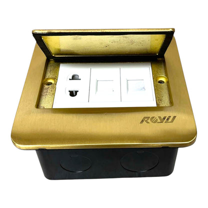 A recessed dual GNDAC outlet socket cover with a brushed gold metal faceplate, a black junction box base, and a white double switch panel inside, shown on a white background.