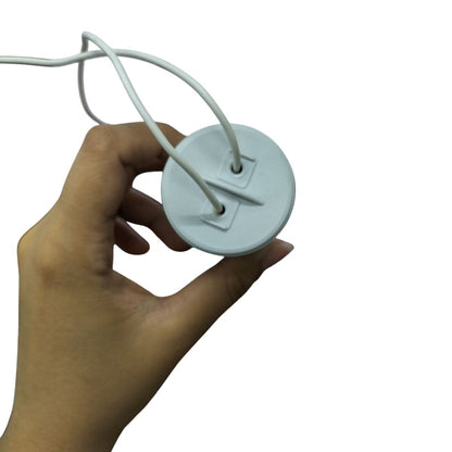 Syscap motor capacitor with two attached white wires for electrical circuitry
