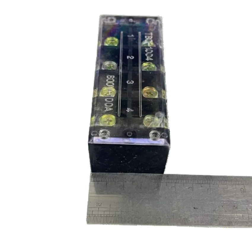 Grippes Sassin 100A 4 Pairs Terminal Block transparent cover four brass screws with ruler for scale