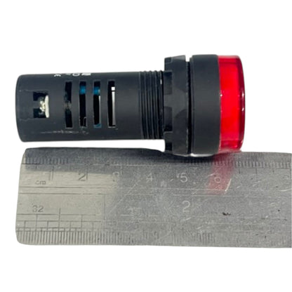 A black industrial push-button indicator light with a red lens, shown next to a metal ruler for scale on a white background.