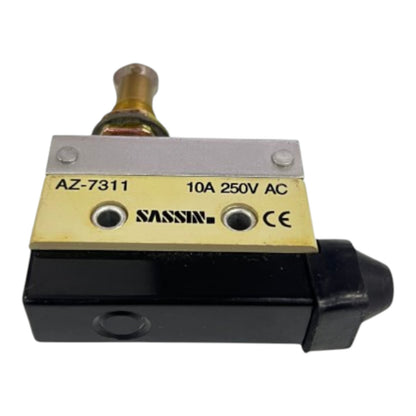 A SASSI pneumatic solenoid valve, model AZ-7311, featuring a black body, a brass plunger, and a gold-colored metal faceplate with printed specifications and branding.