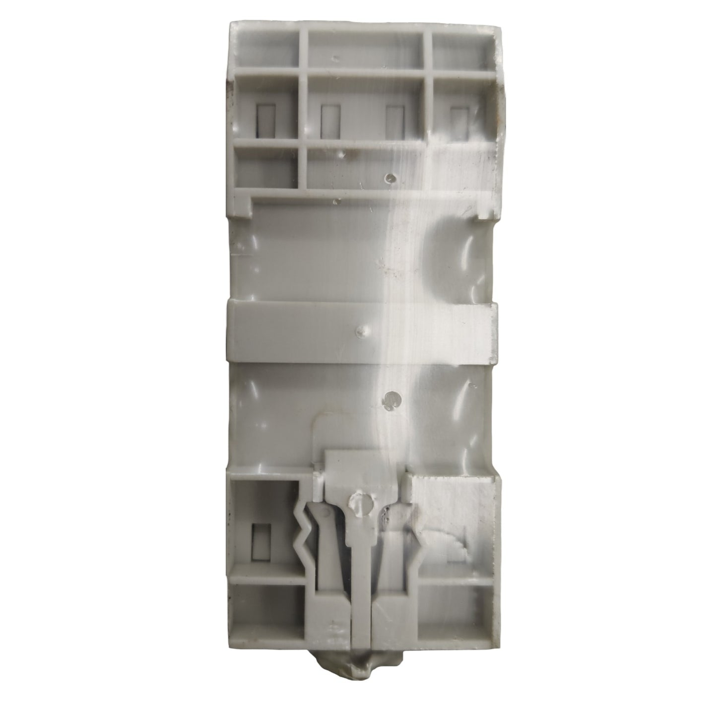 Gray plastic component on a white background