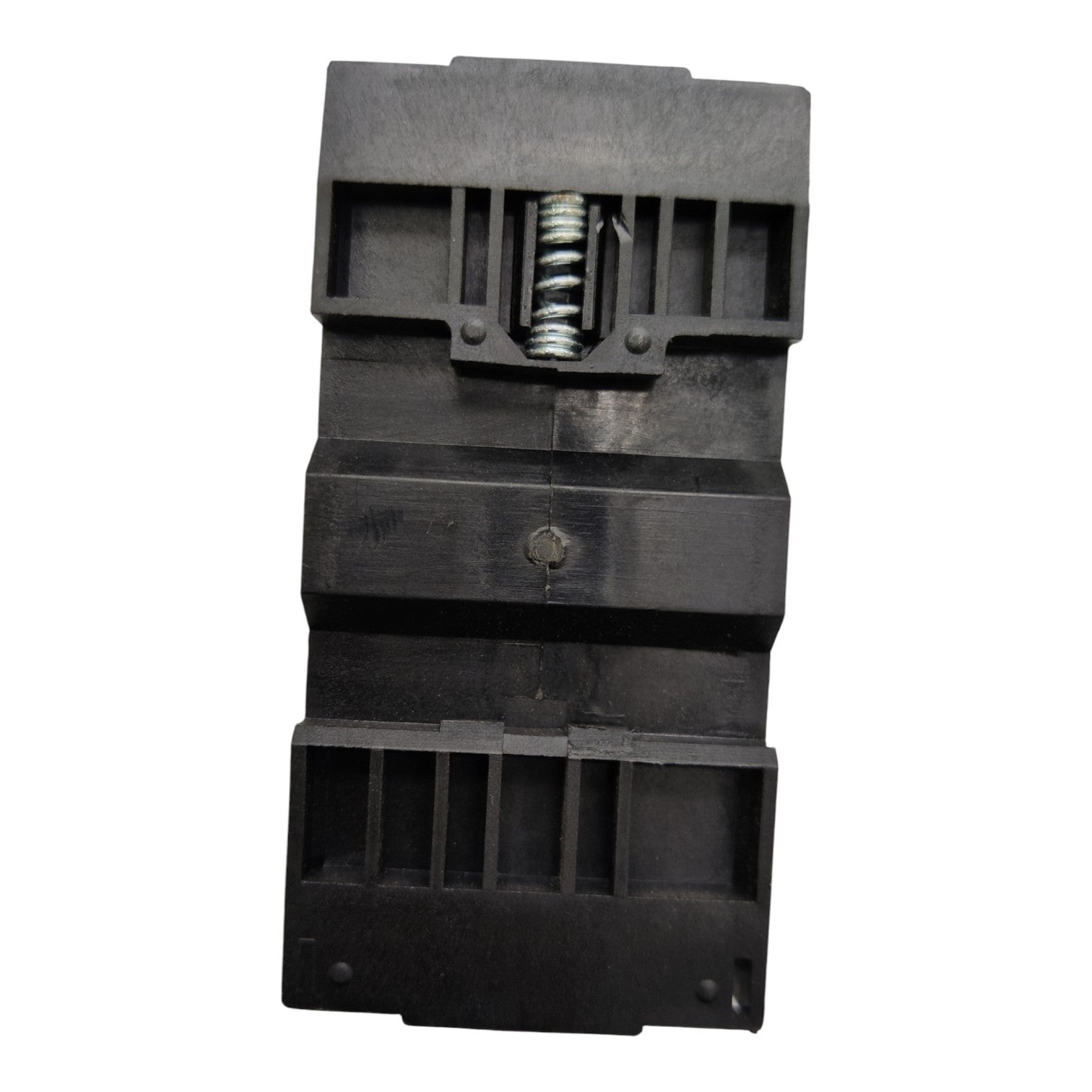Black mechanical component with a spring on a white background