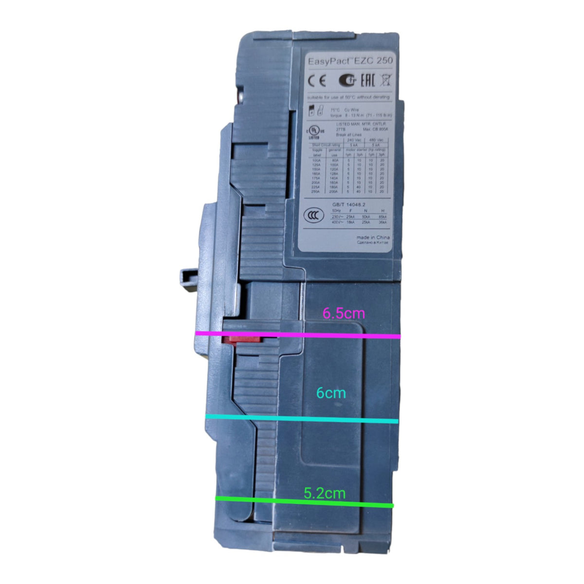 A gray industrial electrical component with overlaid dimension lines and text labels showing measurements of 6.5cm, 6cm, and 5.