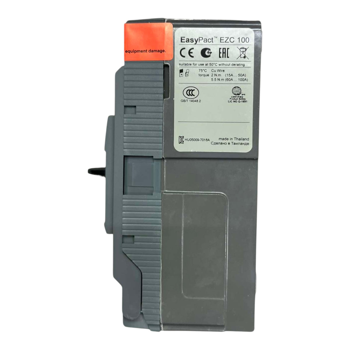 A Siemens EasyPact EZC 100 circuit breaker module, featuring a gray plastic housing with a white technical label and an orange protective cap on top.