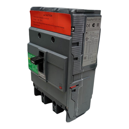 A gray Schneider Electric EasyPart TC20 230V AC circuit breaker with a red caution label and a black switch handle, shown on a white background.