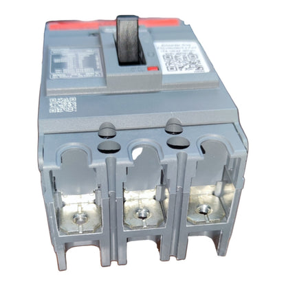 A three-terminal electrical circuit breaker with a gray plastic housing, metal terminals, a black switch handle, and a red top accent, shown on a plain white background.