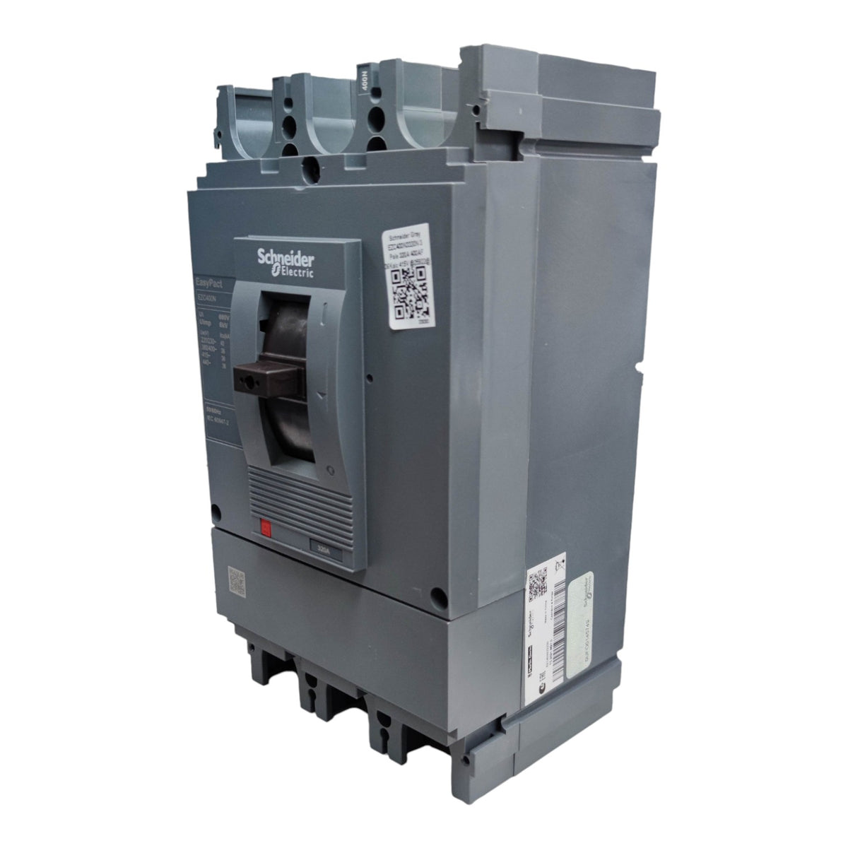 Schneider Electric industrial electrical switchgear unit in gray, featuring a front handle, terminal blocks, and stickers on a plain white background.