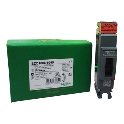 Schneider Electric EZC 100N1040 circuit breaker shown next to its green retail packaging box on a white background.
