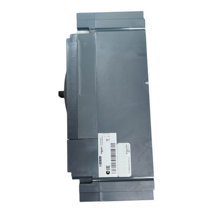A gray plastic industrial electrical component or module with a white barcode label on the lower front, photographed against a plain white background.