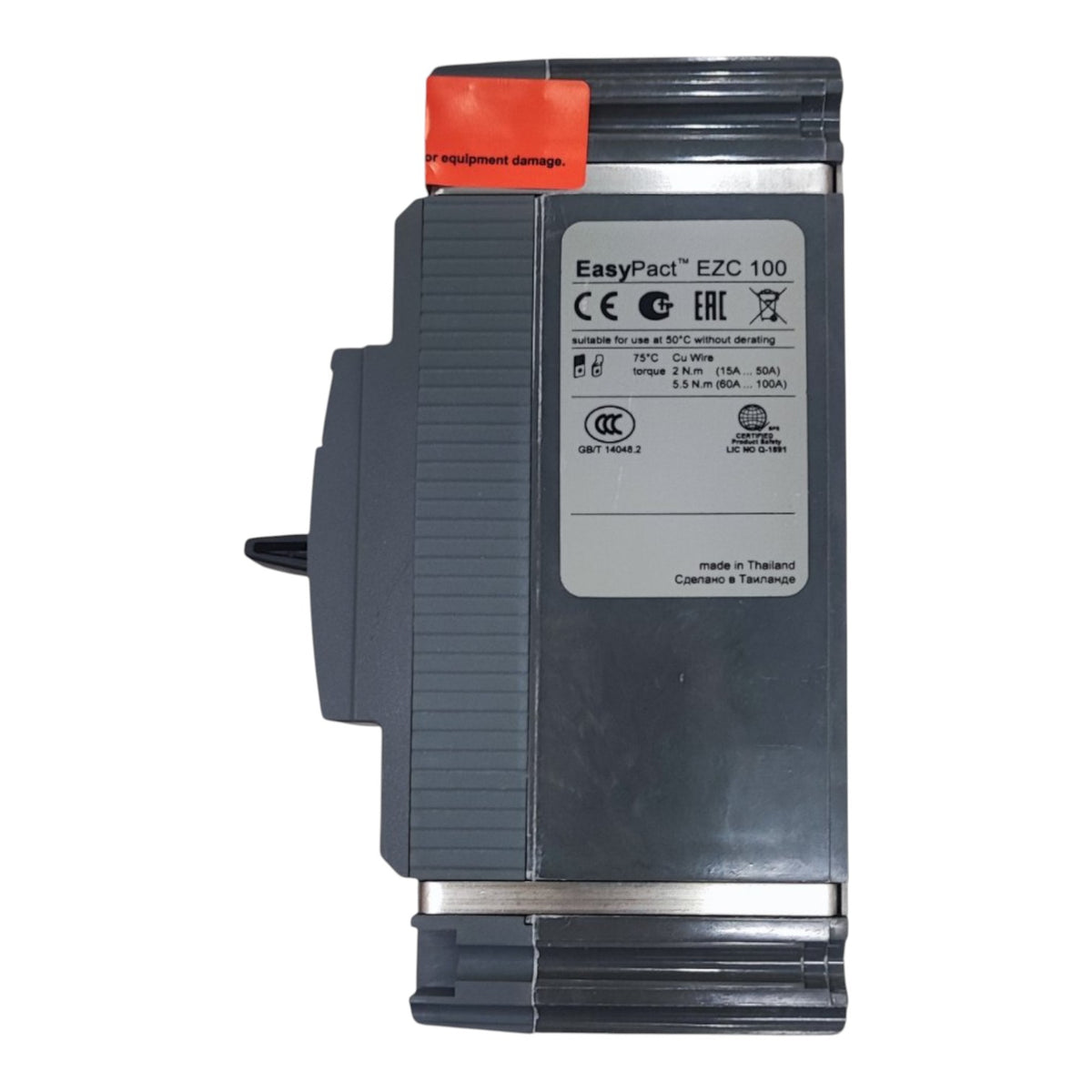 A Siemens EasyPac EZC 100 industrial electronic module, featuring a dark gray plastic housing, a silver label with certification marks, and an orange protective cap on top, shown against a plain white background.