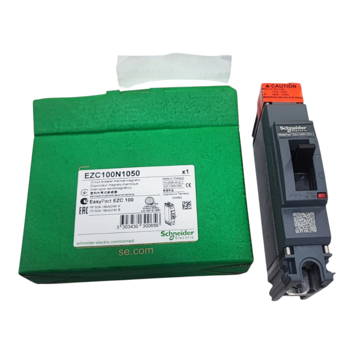 Schneider Electric EZC100N1050 contactor module shown next to its green cardboard packaging box on a white background.
