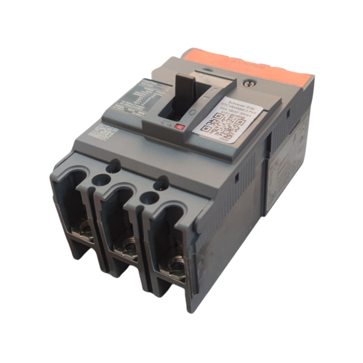 A three-pole circuit breaker with a gray plastic housing, featuring a black central handle, a small orange accent on top, and a white label with QR codes on the side.
