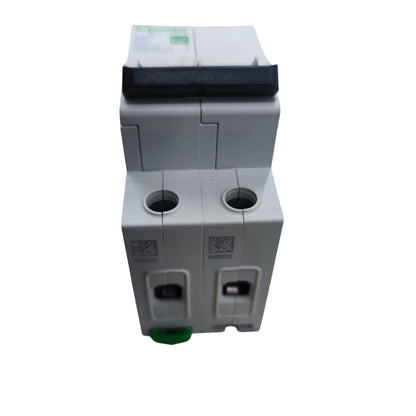 Two gray electrical circuit breakers on a white background