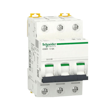 Schneider Electric IC60H C 6A modular circuit breaker, white plastic housing with green accents, yellow top and bottom terminal caps, and a dark gray handle, shown on a plain white background.