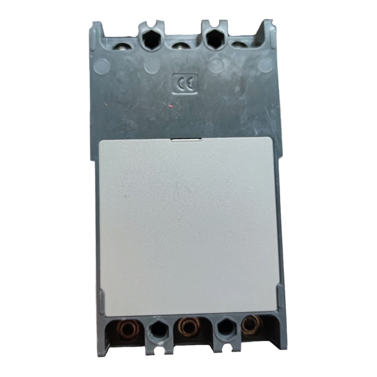 A gray plastic electrical component or terminal block with a large silver metal plate on the front, photographed against a plain white background.