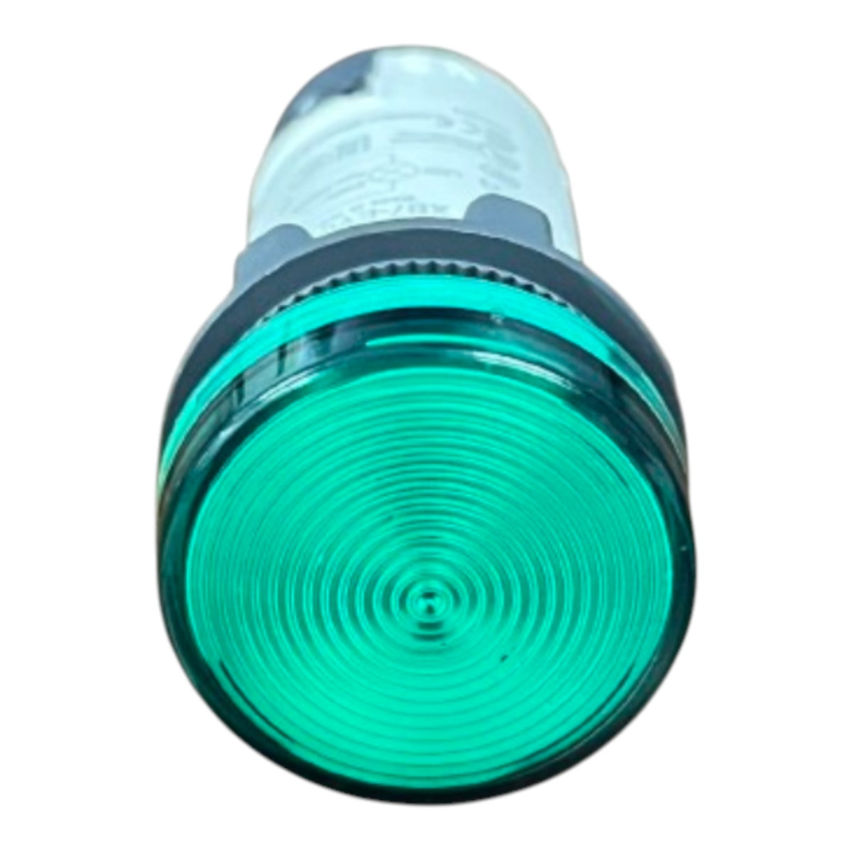 A green industrial indicator light with a ribbed circular lens and a clear cylindrical body, shown against a plain white background.
