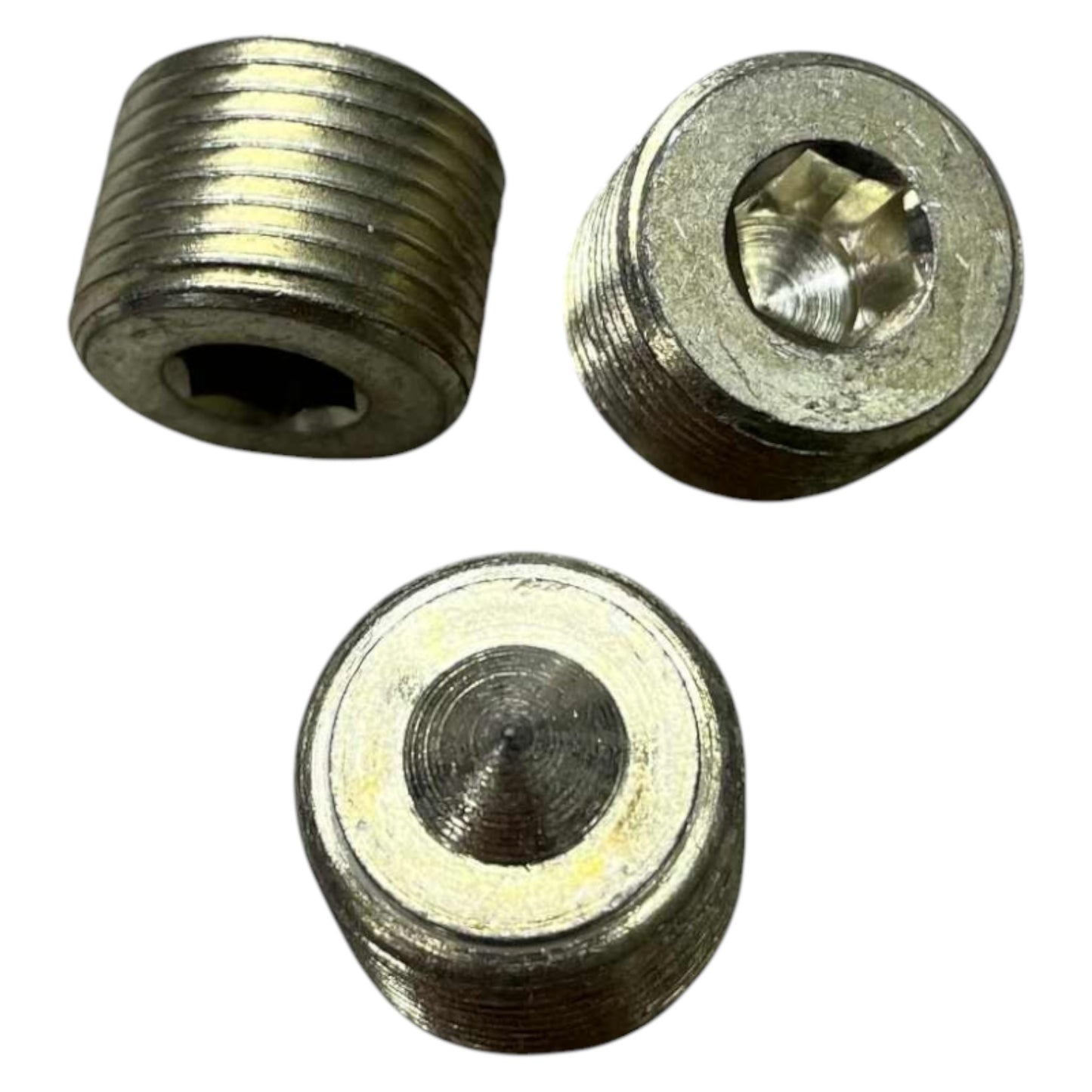 Three metal bushings on a white background