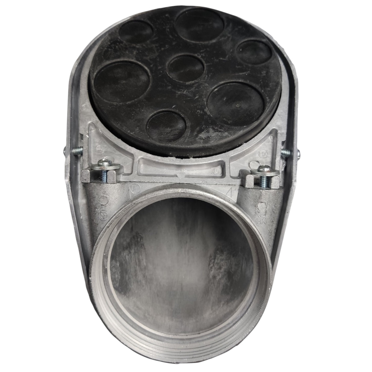 A metal automotive part with a large circular opening, a silver-toned body, and a black circular top plate with multiple recessed circular details, shown on a plain white background.