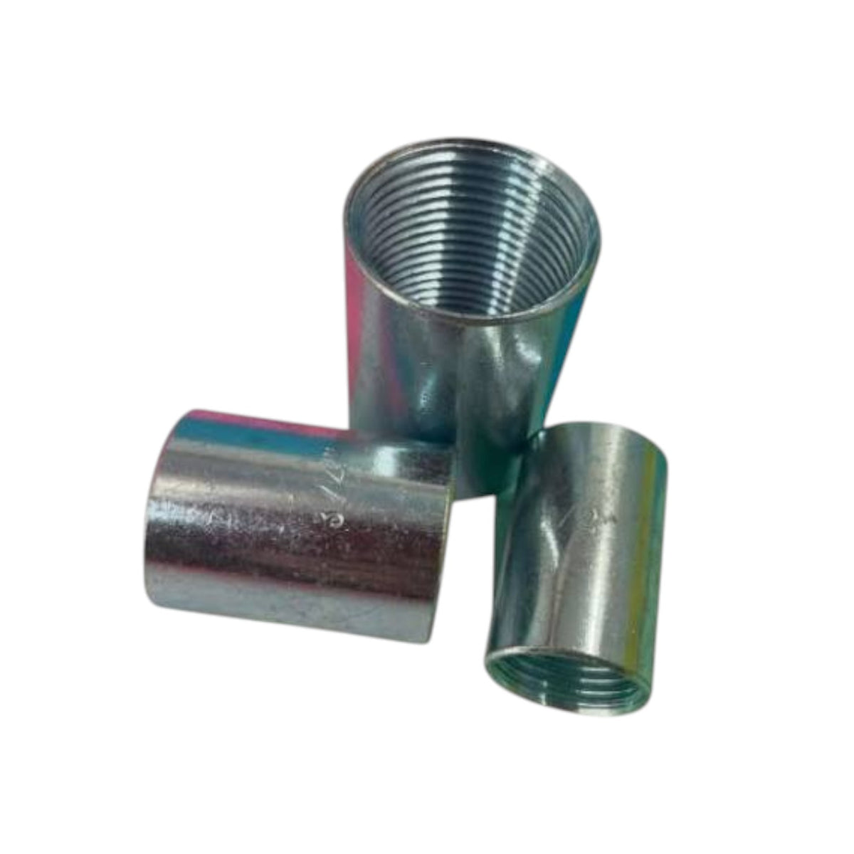 Three galvanized metal threaded pipe couplers of different sizes, including one 3/4 inch and one 1/2 inch, displayed on a clean white background.