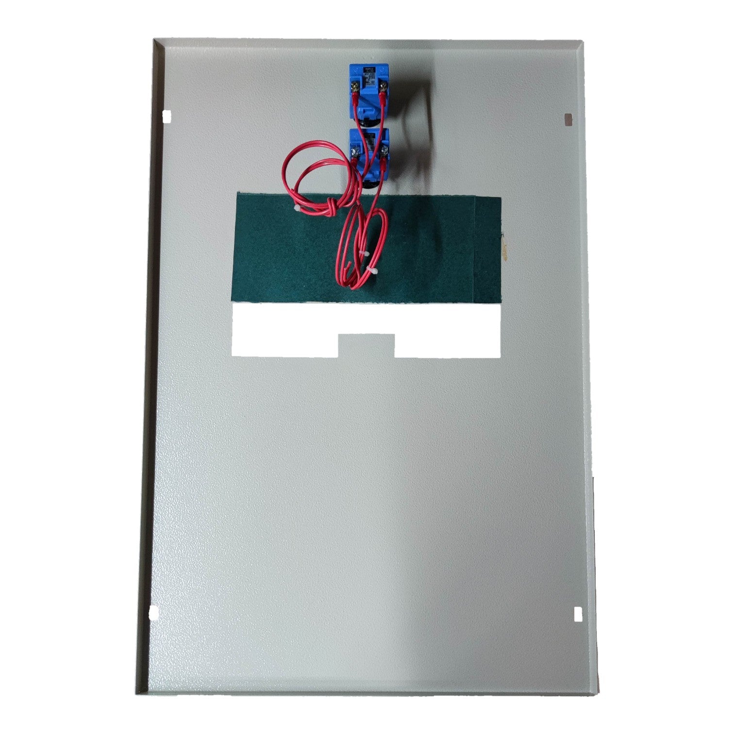 Metallic panel with green component, red wires, and blue connector on a white background