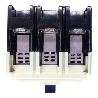 A three-phase electrical terminal block connector with black plastic top covers, silver metal contacts, and an off-white plastic base, isolated on a white background.