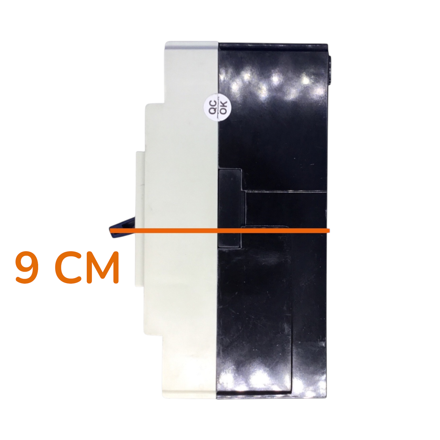 A replacement battery for a device, shown from the side with a dimension overlay indicating a width of 9 cm. The battery has a glossy black top surface, a white side panel, and a small circular 'QC OK' sticker.