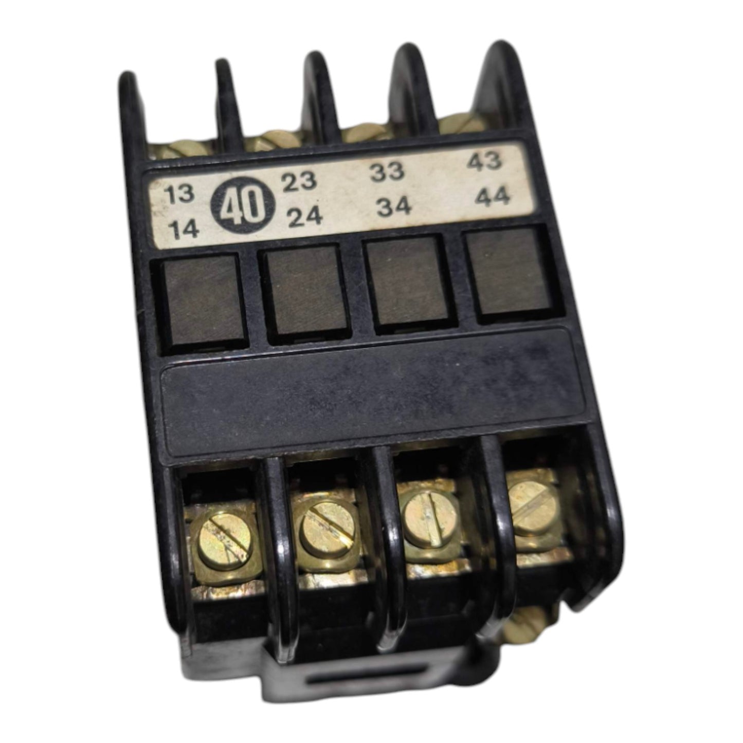 A black plastic electrical contactor terminal block with gold screw terminals and a white printed terminal numbering sticker, shown on a white background.
