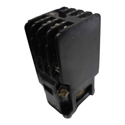 A black plastic electrical relay component with multiple terminal posts on one side, shown on a plain white background.