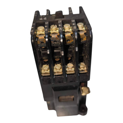 A three-phase electrical contactor with black plastic housing and brass terminal screws, shown on a plain white background.