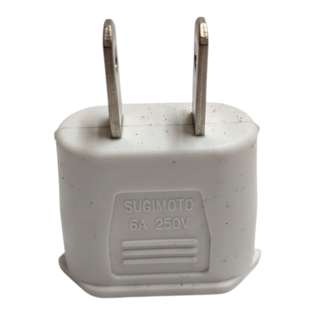 A white plastic 6A 250V Sugimoto wall plug adapter with two metal pins, shown against a plain white background.