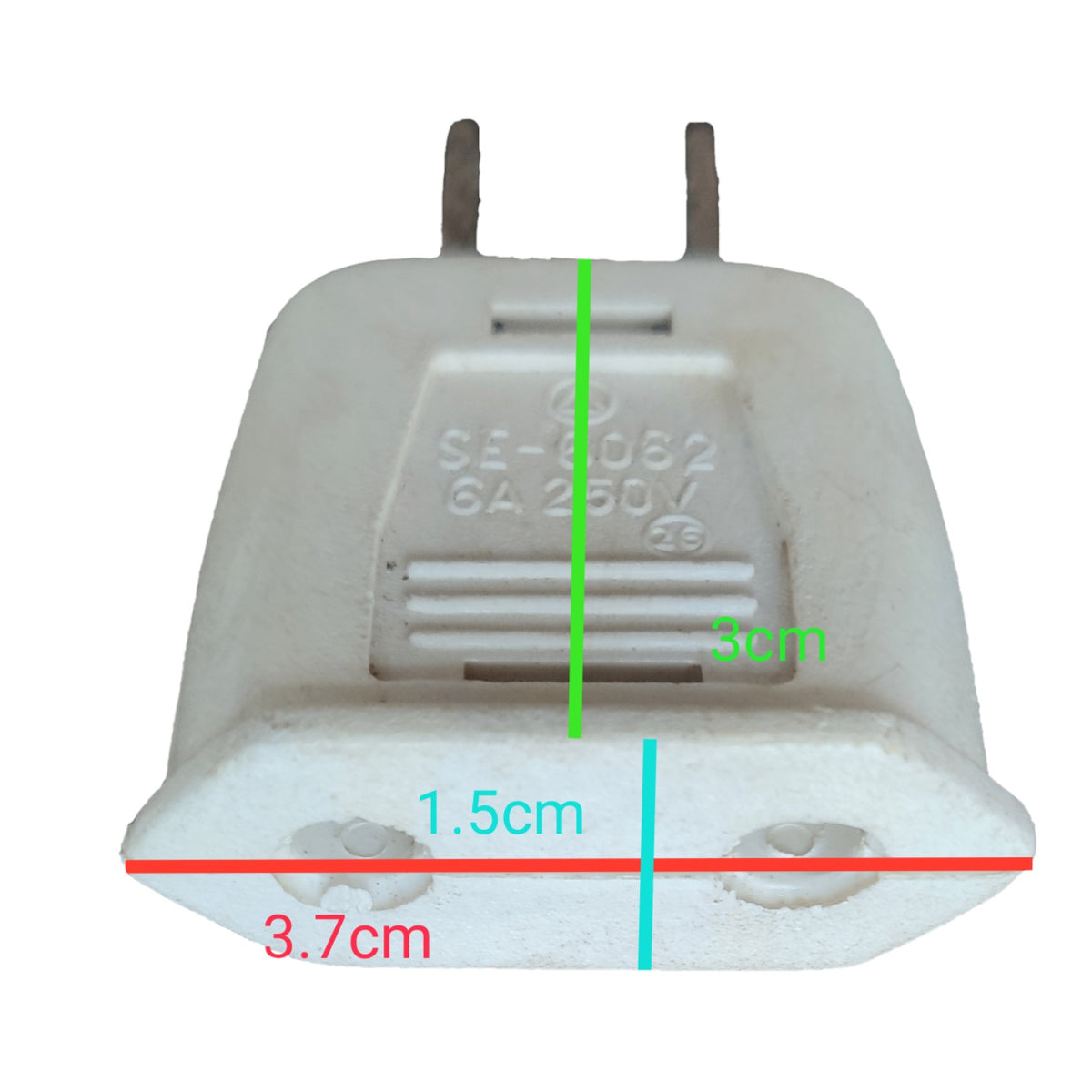 A white plastic electrical plug adapter shown on a plain white background with overlaid dimension lines and labels indicating 3 cm height, 1.5 cm width, and 3.