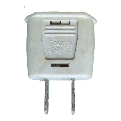 A white plastic US plug adapter with two metal pins, featuring embossed specifications 'SE-6082 60V 250V' on the front face.