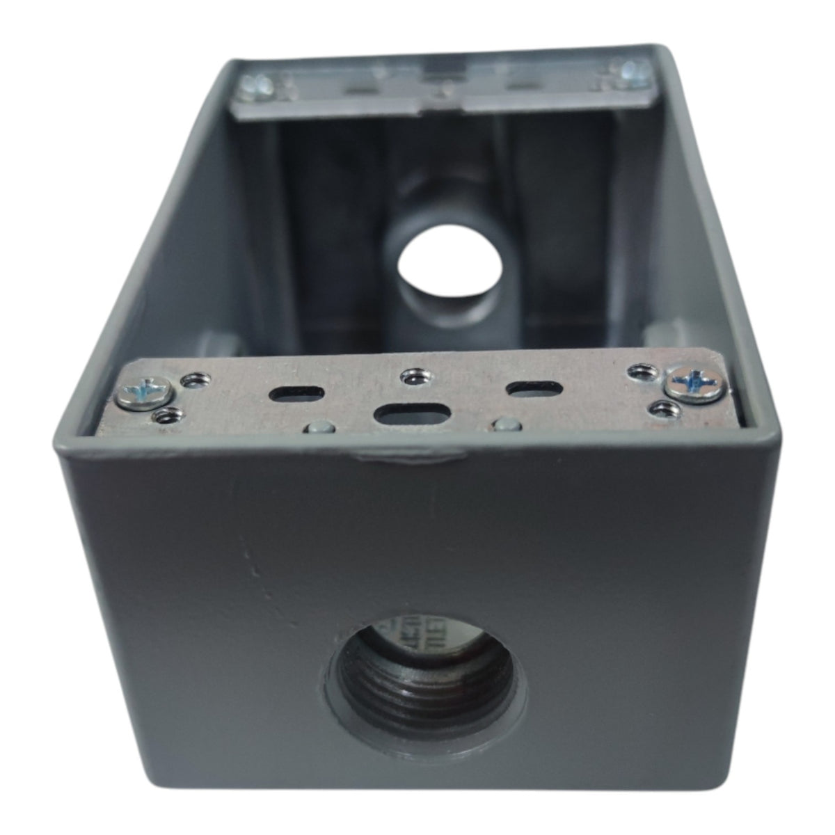 A dark gray metal electrical junction box with threaded pipe connectors on the front and side, secured with screws on a white background.