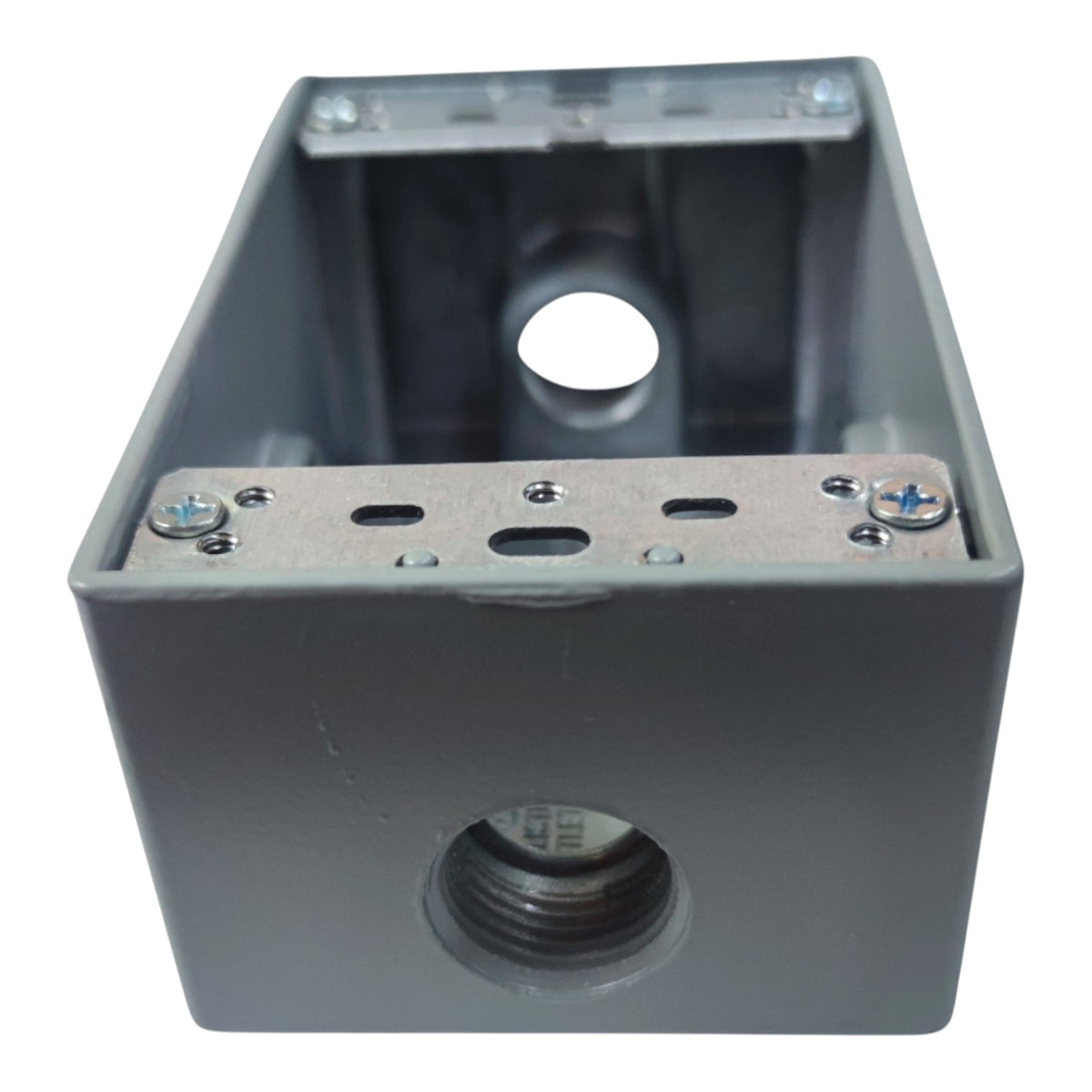 A gray metal electrical junction box with threaded pipe connectors on the front and top, secured with screws, shown on a white background.