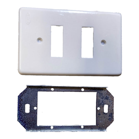 A white double-gang light switch plate cover shown above a dark metal mounting bracket on a plain white background.