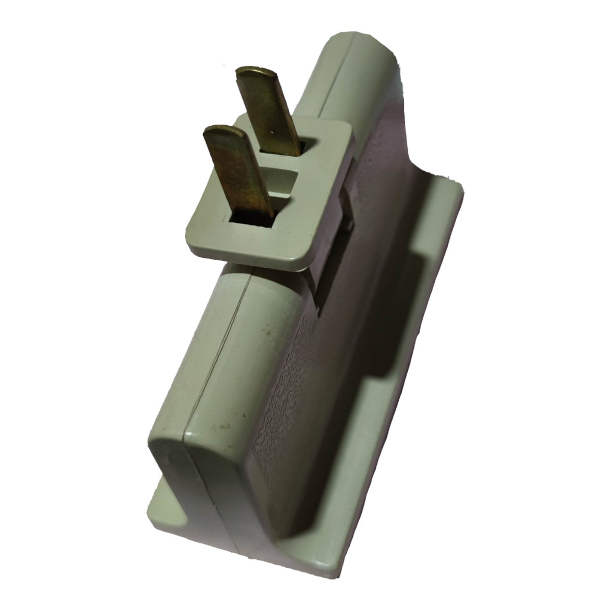 A molded plastic electrical outlet adapter with two flat grounding prongs, shown on a plain white background.