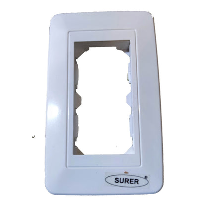 A white plastic electrical outlet cover plate with a Surer brand label at the bottom, shown against a plain white background.