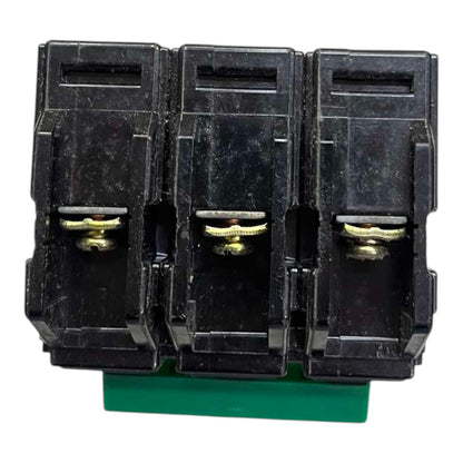 Three black plastic electrical terminal blocks mounted on a green base, shown against a plain white background.