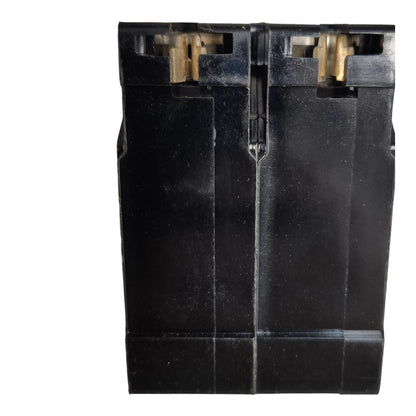 A black plastic dual-gauge magazine or grip insert with brass-colored metal contacts visible at the top, isolated on a white background.