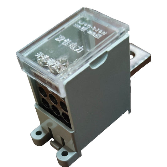 Electrical component with clear cover and metallic base on a white background