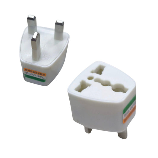Two white plastic UK plug adapter travel adapters shown on a plain white background, one displaying the three-pin plug and the other showing the three-pin socket side.