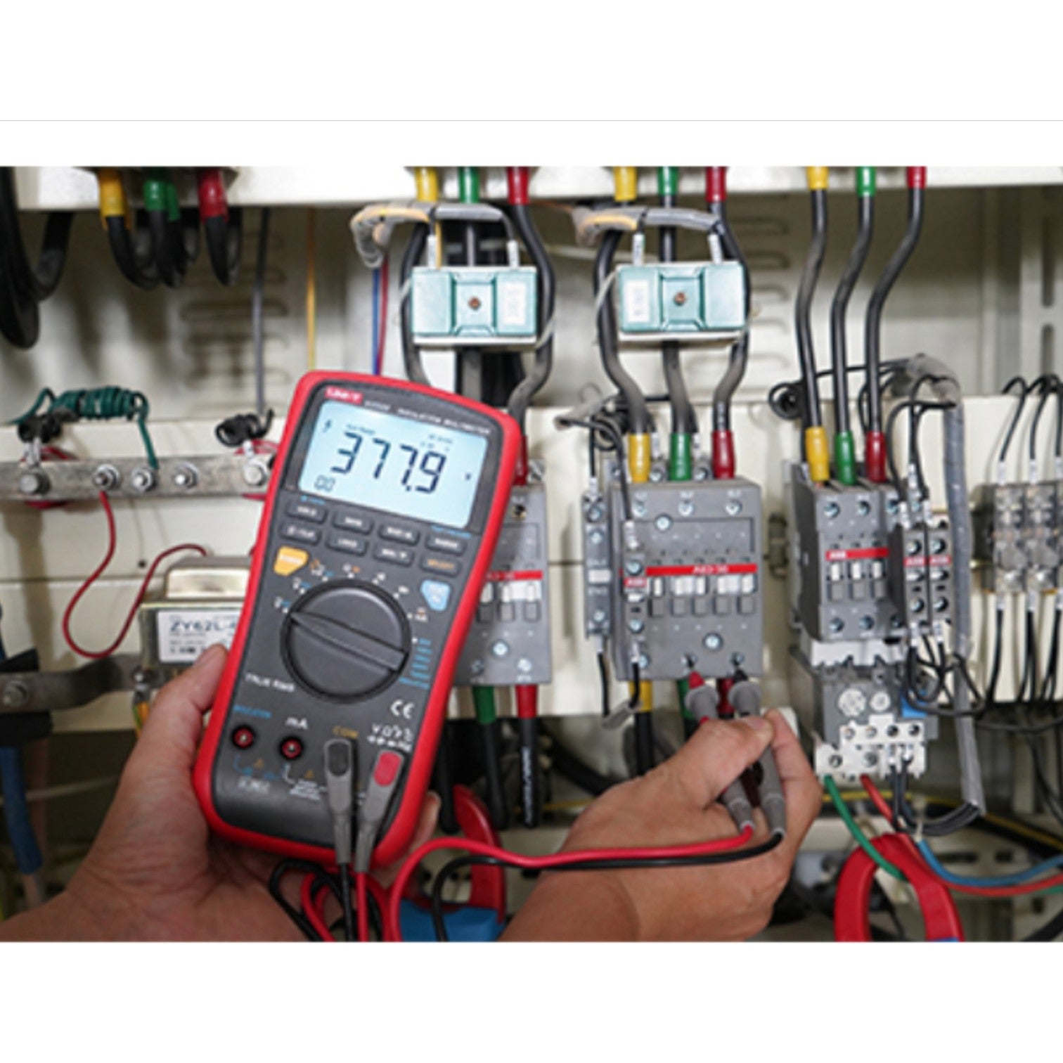 Multimeter being used on electrical panel with wires and switches in the  background UNI-T Digital Insulation Tester UT-533 1000V AC/DC 600mA AC/DC Current Resistance Tester Electx Electrical Supply
