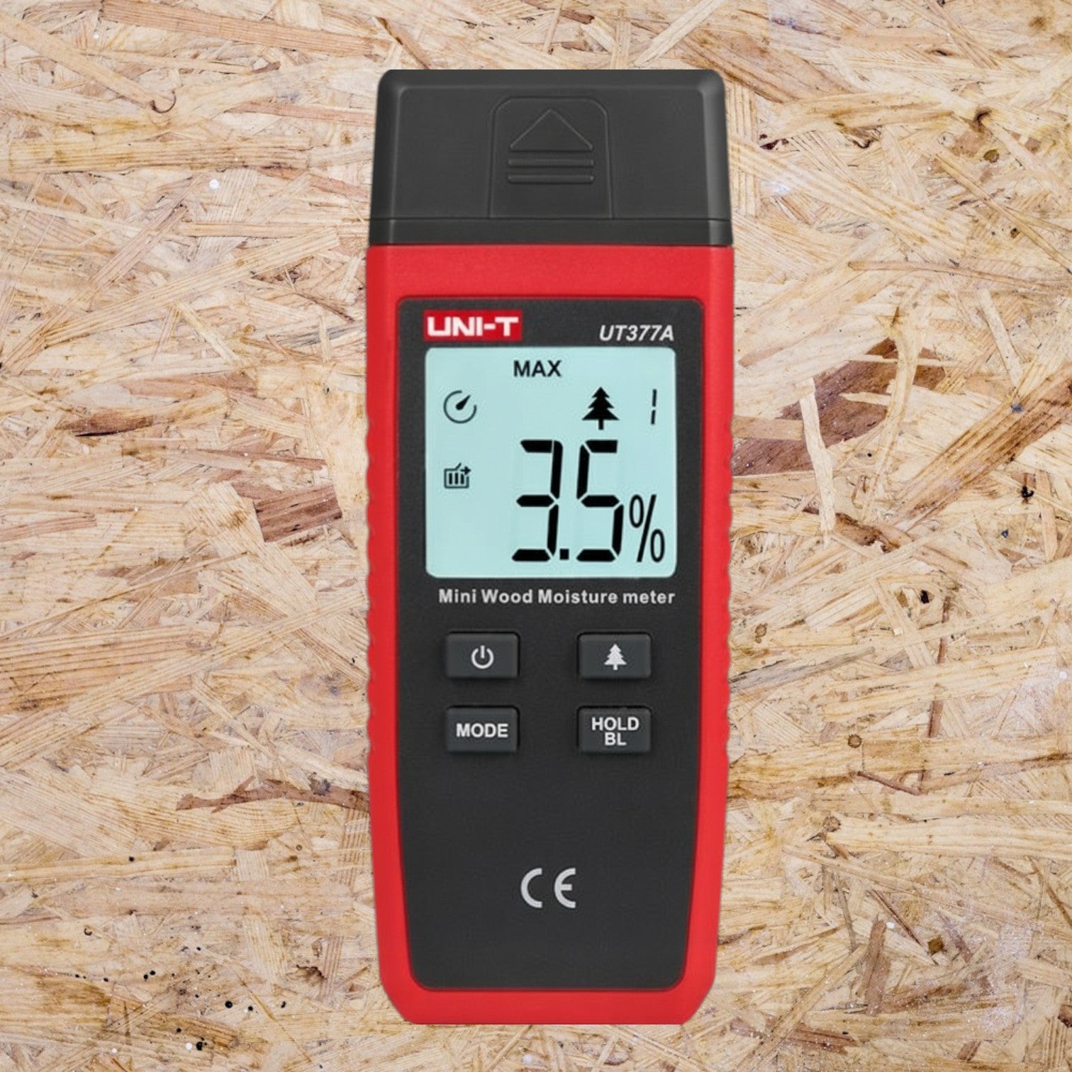 UNI-T UT377A mini wood moisture meter on a wooden background UNI-T Mini Digital Wood Moisture Tester UT377A with LCD Display Applicable for 4 Types of Wood Batteries not Included 3pcs AAA Electx Electrical SUpply
