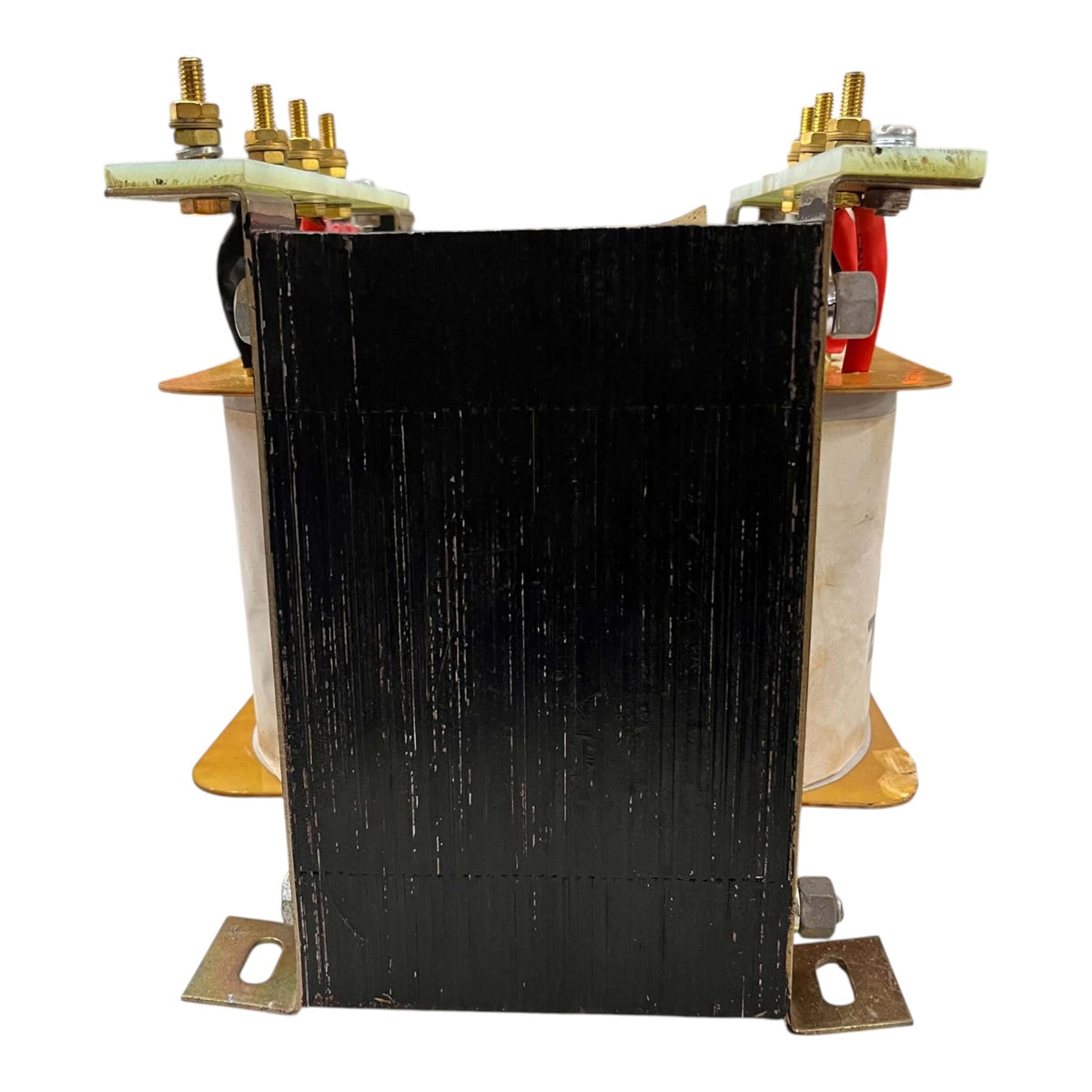 A large industrial electrical transformer with a prominent black front panel, white insulating sleeves, brass terminal hardware, and red disconnect switches, isolated on a white background.
