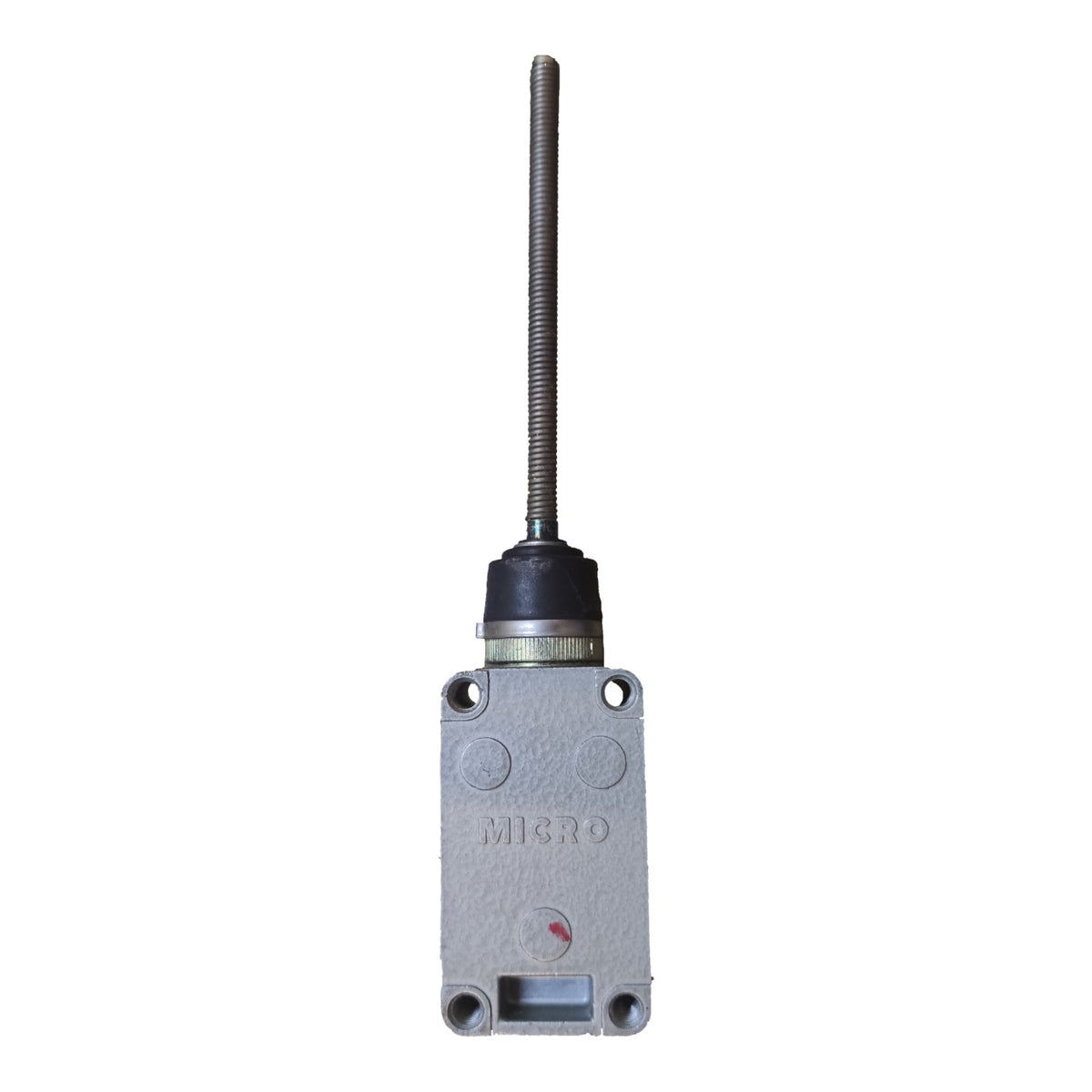 A gray cast metal industrial control valve with a long threaded metal rod extending upwards, featuring a black rubber grommet and a small red indicator mark on the front face.