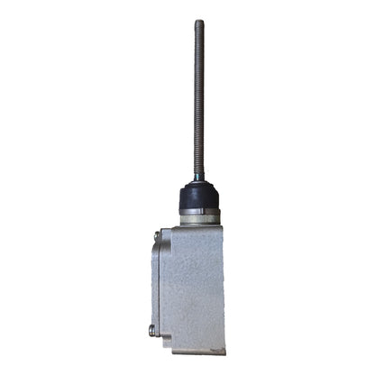 A silver metal industrial control box with a long threaded rod extending vertically from the top, set against a plain white background.