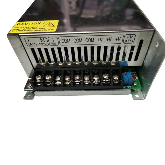 Electrical power supply unit with labeled terminals on a white background