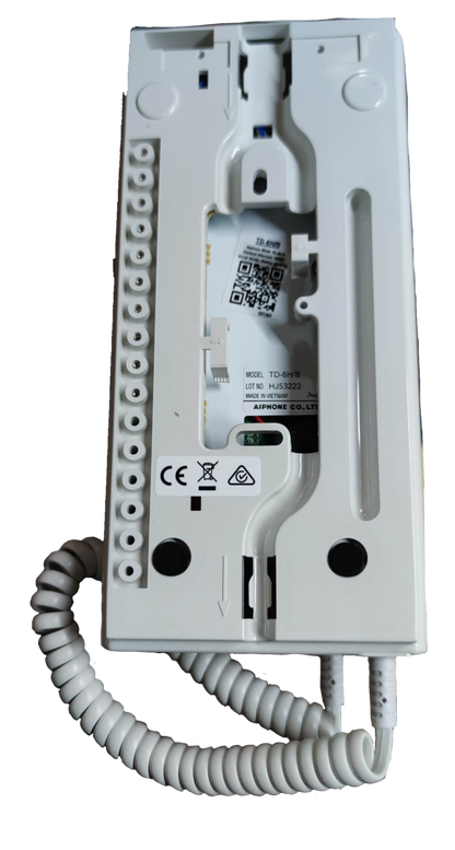 Aiphone 6 station intercom system white back panel with wiring ports and coiled cable for security communication