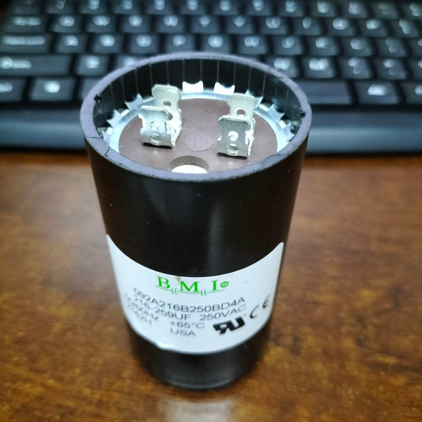 BMI 216-259MFD AC capacitor 250V with durable housing for electrical applications